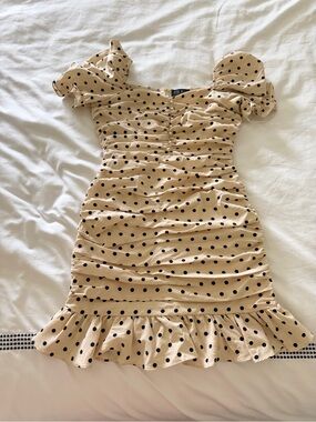 In the style Polka Dot Puff-Sleeve Mini Dress in Cream